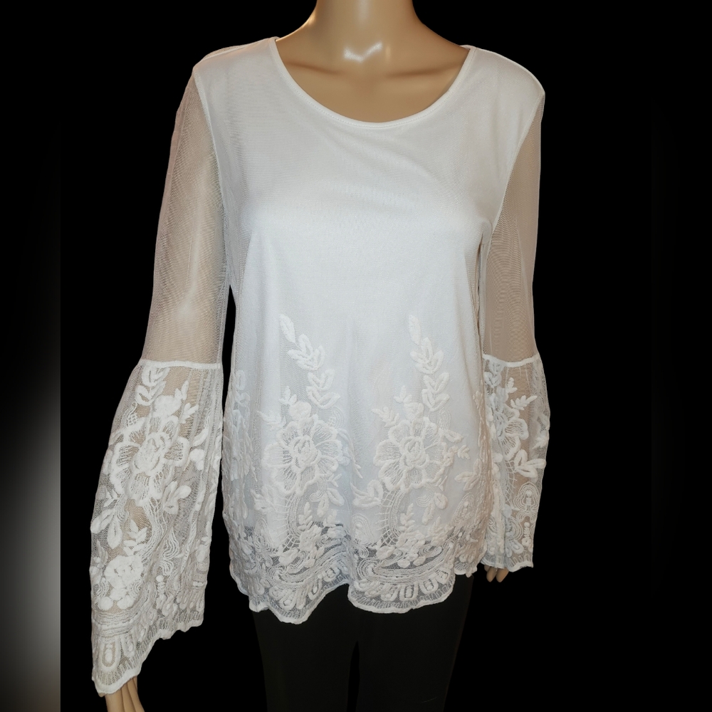 Beautiful lace overlay bell sleeved blouse